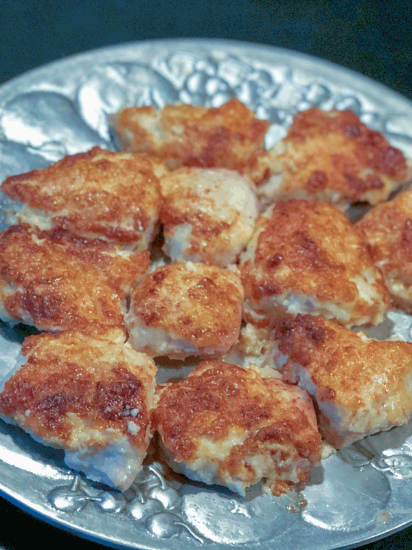 Cheesy CHiekn on a silver platter