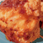 Close up of cheesy chicken cooked and brown