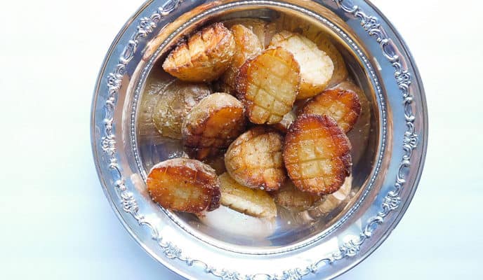 Cooked Criss Cross Potatoes in silver bowl