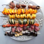 Grilled Rainbow Veggie Skewers on a platter