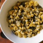 Corn, pepper and onion salsa in a white bowl