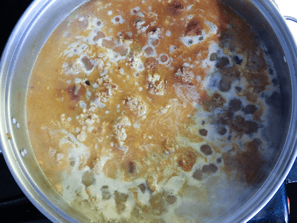 Sausage rice and peas sauteing