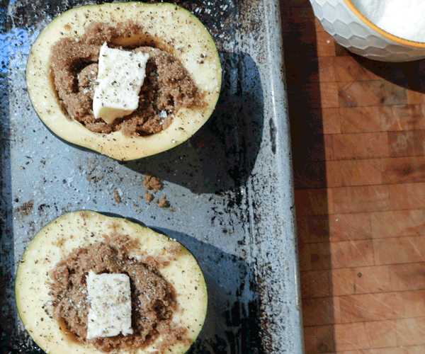 Before cooking squash cut in half stuffed with brown sugar and dotted with butter