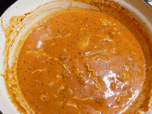Creamy Tomato Based Soup in a white pot