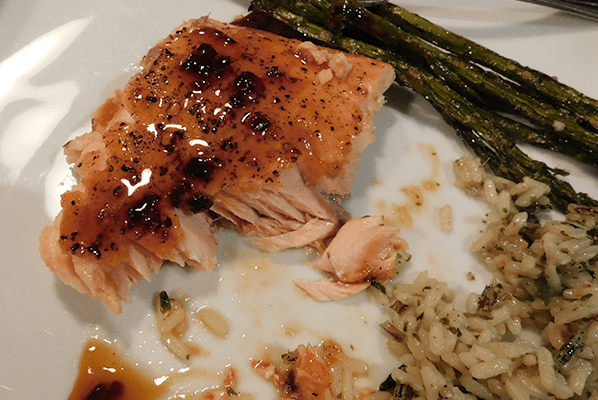 Salmon with maple chipotle glaze with asparagus and rice