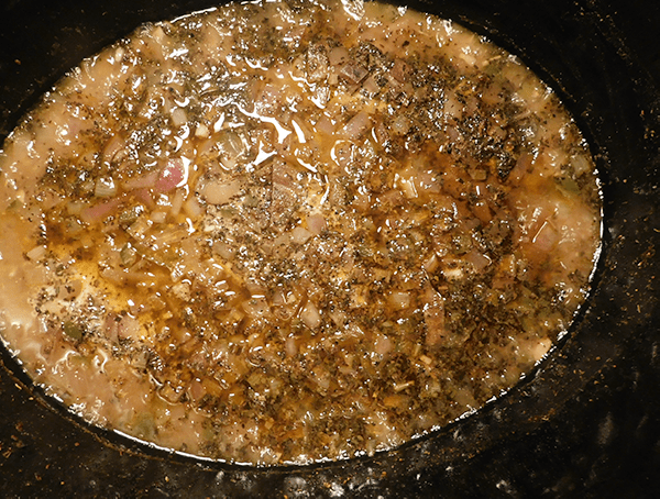 Cooked basil chicken in crock pot