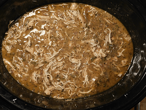 Shredded Basil chicken in Crock Pot with lots of sauce