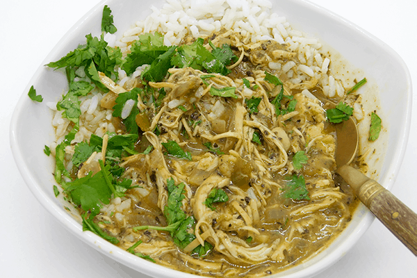 Shredded Basil Chicken in bowl with rice and cilantro mixed in