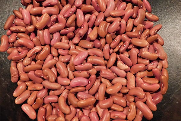 Dried red beans on a black background