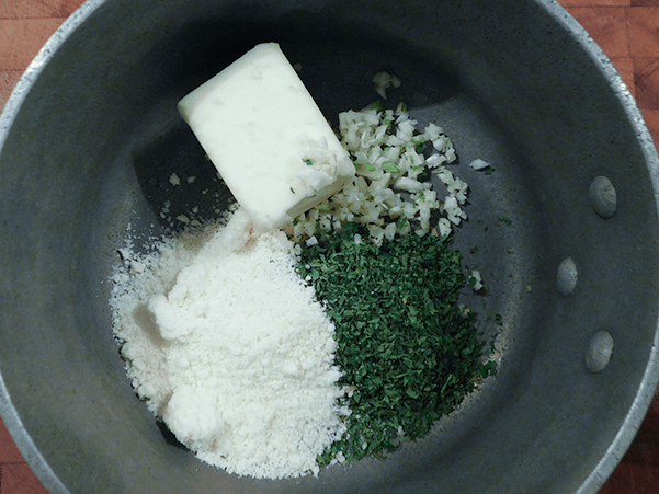 Butter, garlic, parmesan and parsley in a small sauce pot