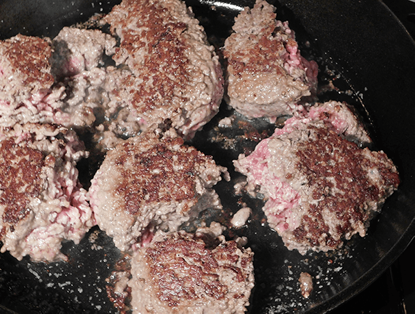 Carmelizing burgers in cast iron skillet after first flip