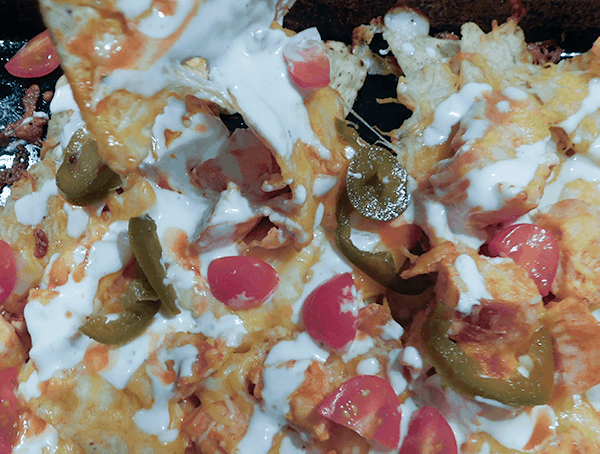 Close up of scrumptious melty Buffalo Chicken Nachos