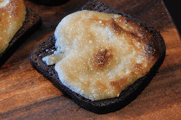 Prepared Pumpernickel Onin Toasties closeup