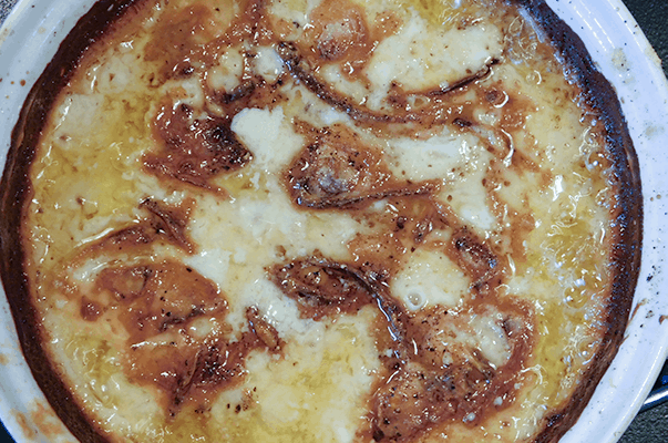 Creamy Scalloped Onions caramelizing after cooking 90 minutes