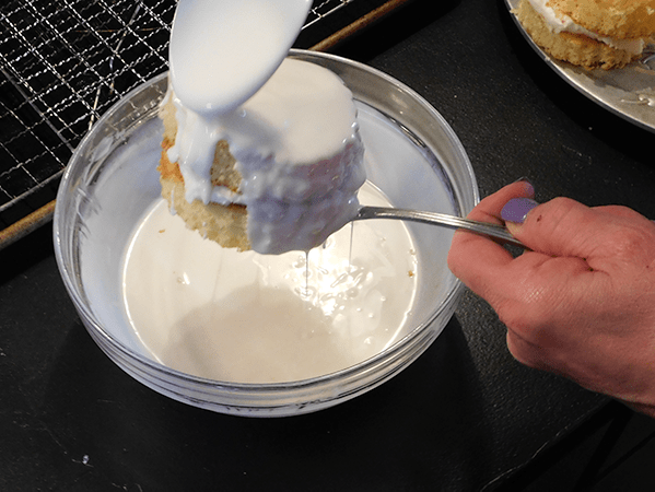 Coating Zebra Cake over bowl