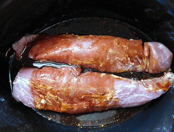 Pork Tenderloins in a crockpot with marinade