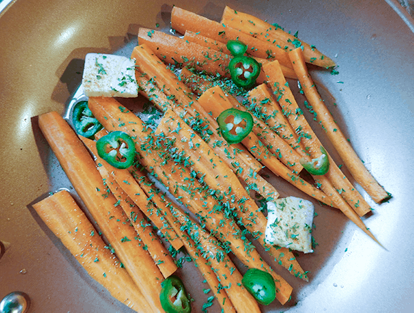 All ingredients together in pan for Sweet and Spicy Carrots