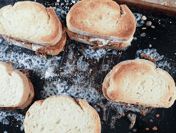 Italian Beef Sandwiches ready to eat, on a sheet pan