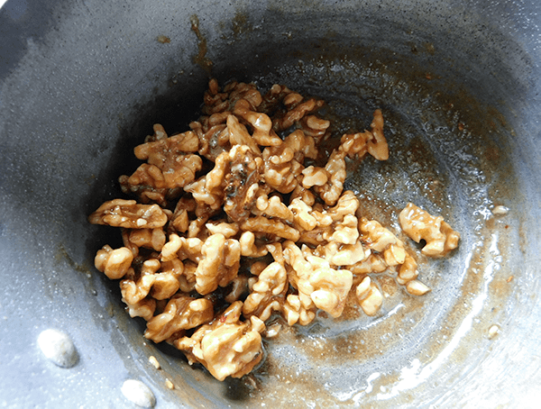 Walnuts and syrup cooked donw for Maple Walnut Baked Brie