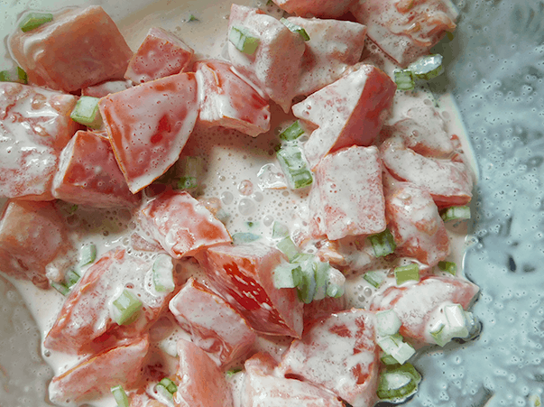 Tomato Sald in mixing bowl