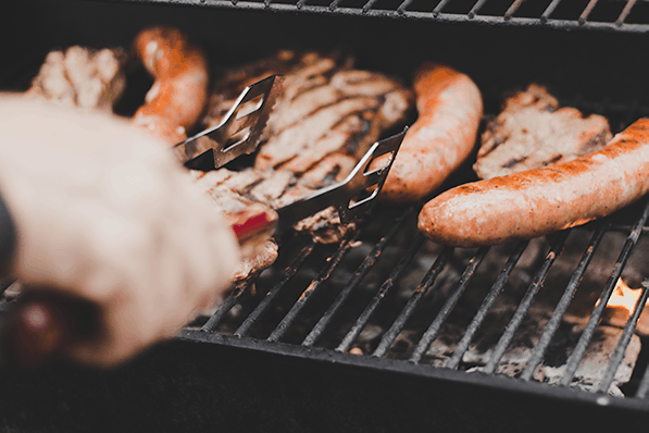 Grilling sausage and chicken for Grilled Jambalaya