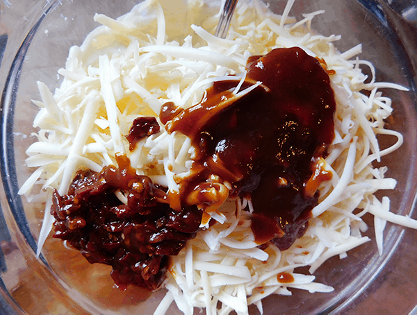 Ccheese and chiptole peppers in a bowl