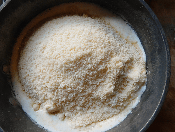 Cream and Parmesan Cheese in medium saucepan for Garlic Alfredo Sauce