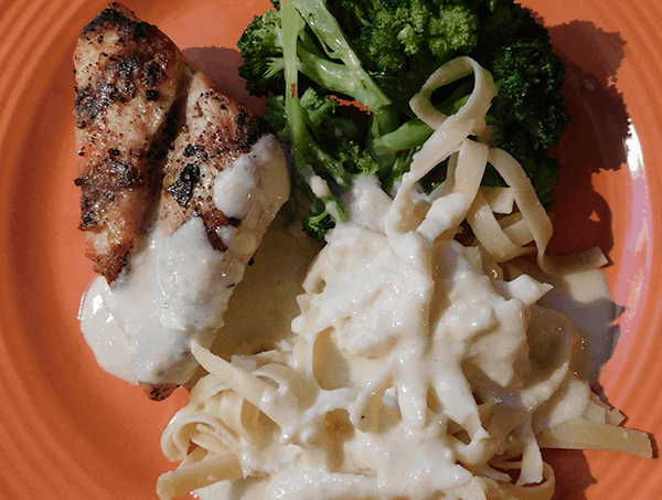 Garlic Alfredo Sauce on Chicken and Fettucine Noodles