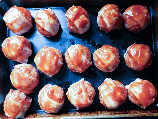 Meatloaf Meatballs on a baking dish ready to go in the oven. 