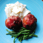 Meatloaf Meatballs on a turquoise plate with mashed potatoes and green beans