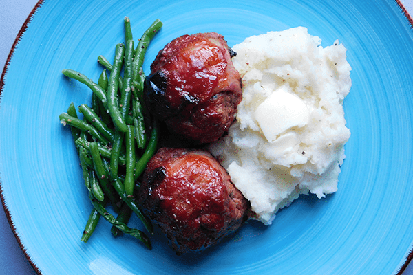 Meatloaf Meatballs on a turquoise plate with mashed potates