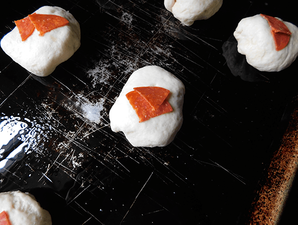 Pepperoni Balls ready to bake on a baking sheet