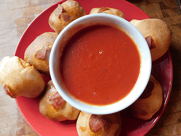 Pepperoni Balls and Saice on a red plate