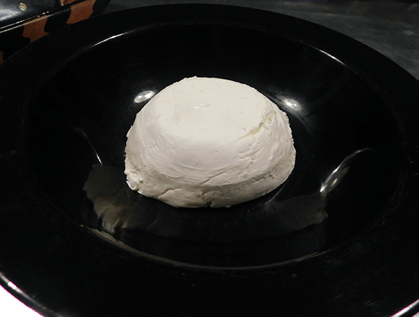 Molded cream cheese in a serrving bowl