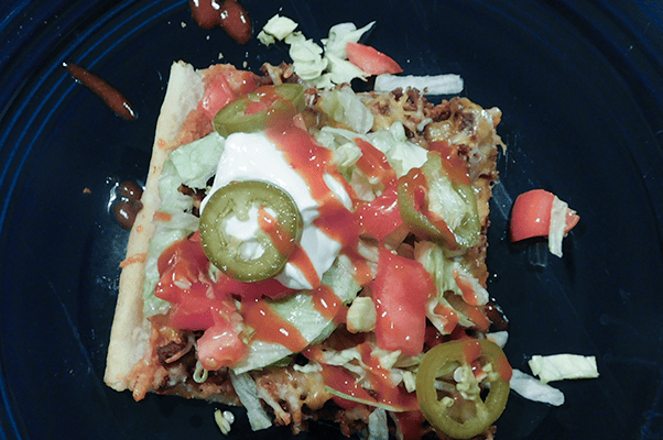 Taco Pizza on a blue plate