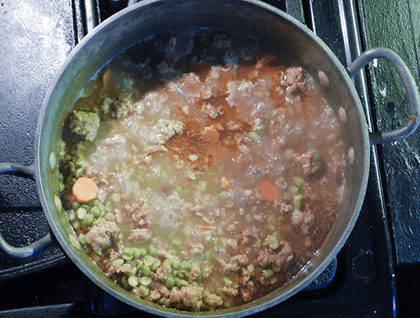 Sausage Split Pea Soup boiling on the stove