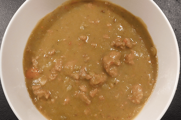 Sausage Split Pea Soup in a white bowl