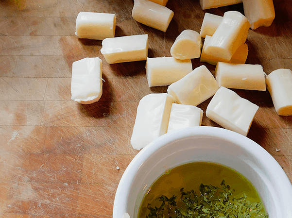 Oil and cheese for Cheese Stuffed Garlic Rolls